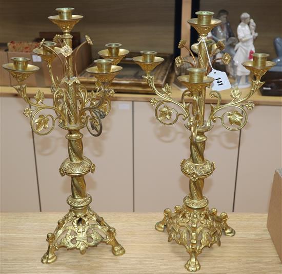 A pair of French gilt metal four branch five candelabra height 51cm